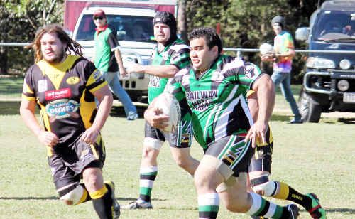 Herbie Henderson charges through Caboolture’s defence with forward Matt Zillman providing support. Herbie Henderson charges through Caboolture’s defence with forward Matt Zillman providing support.